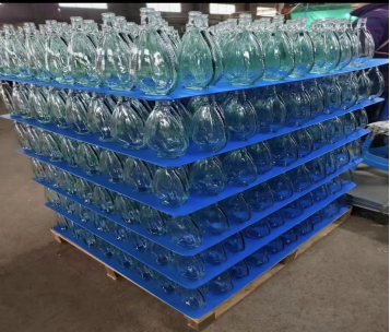 Plastic Layer Pads for Bottles in Storage